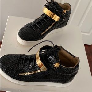 Boys top of the line Giuseppe Zanoti sneakers.